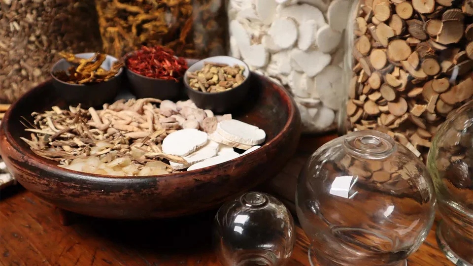 Ingredients for Chinese herbal liniment on a table