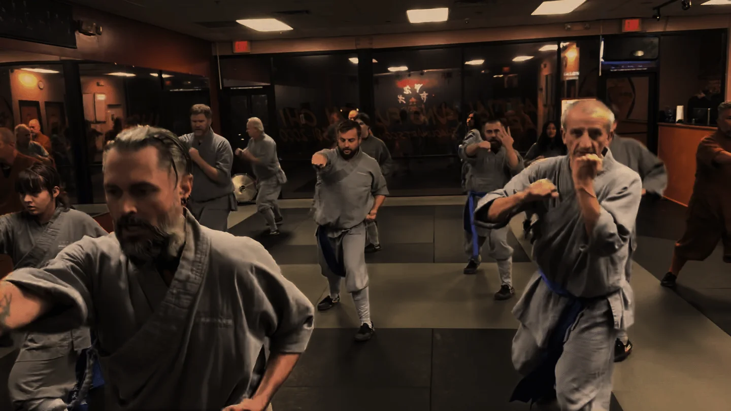Students practicing Kung Fu together at the Peoria school