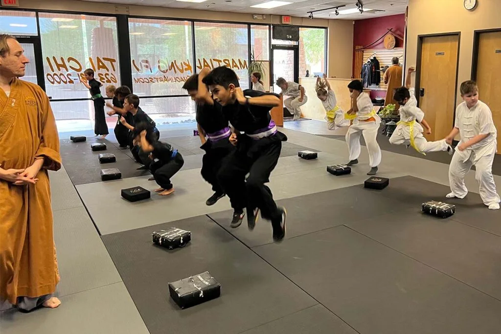 Students practicing in a Shaolin Arts kids class